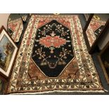 An antique Persian Kaoliyai carpet 257 cm x 170 cm