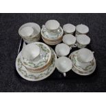 Thirty six pieces of antique Phoenix bone tea china