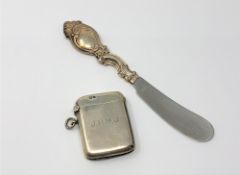 A silver vesta case and an ornate Danish silver-handled butter knife stamped 'COHR' (2)