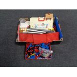 A box of plastic construction sets, Fisher Price play school,