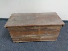 An antique pine blanket chest.