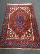 A Bidjar design rug, 205cm by 137cm CONDITION REPORT: Areas of moth damage.