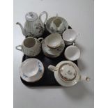 A tray containing 13 pieces of Japanese eggshell tea china together with a Maling teapot and Royal