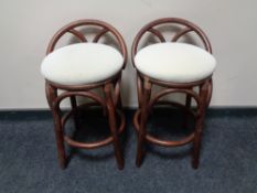 A pair of contemporary bentwood stools