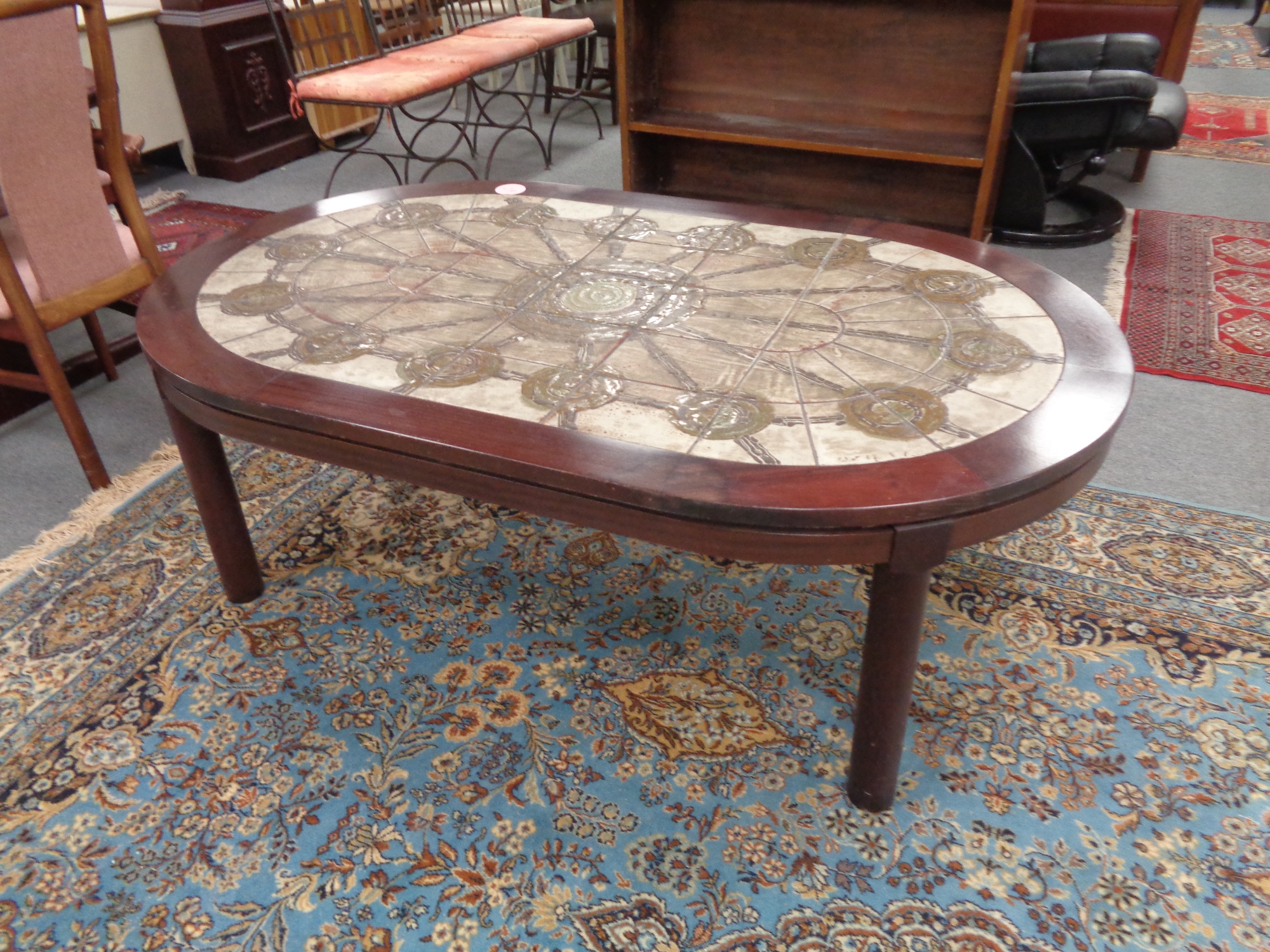 A twentieth century Danish oval tiled coffee table