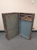 An early twentieth century metal bound trunk/wardrobe