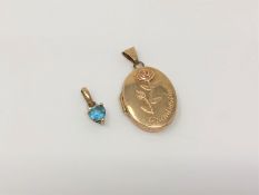 A 9ct gold locket and a topaz set pendant