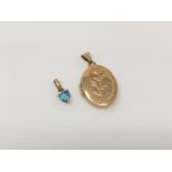 A 9ct gold locket and a topaz set pendant