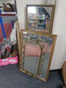 A brass framed mirror together with two gilt framed mirrors