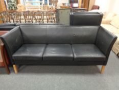 A twentieth century Danish black leather three seater settee