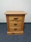 A Mexican pine three drawer chest