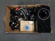 A box containing Wifi cameras, headphones, Blaupunkt speaker etc.