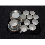 A tray of approximately 27 pieces of Elizabethan Lucerne tea china