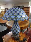 A Tiffany style leaded glass table lamp with matching shade