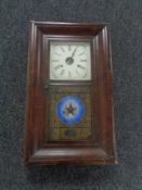 A nineteenth century mahogany cased American wall clock made by E.N.