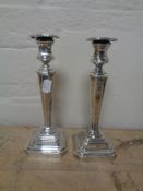A pair of loaded silver candlesticks, Sheffield marks,