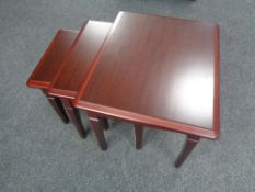 A nest of three Stag Minstrel tables