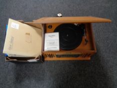 A retro Vintage Collection music centre together with a box of a small quantity of vinyl