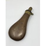 A 19th century brass and copper powder flask by James Dixon & Sons,