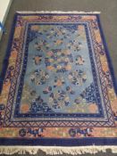 A Chinese rug on blue ground,