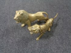 Two brass figures of a Lion and Lioness