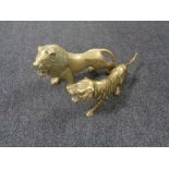 Two brass figures of a Lion and Lioness