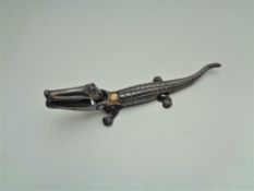 An early twentieth century cast metal crocodile nut cracker