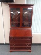 A mahogany bureau bookcase