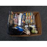 A box of assorted Star Wars toys, figures, jigsaws,