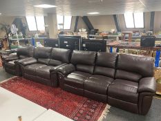 A three piece Lay-Z-Boy brown leather electric reclining suite comprising of three seater settee,