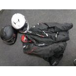 Two MT motorcycle helmets together with a motorcycle jacket.