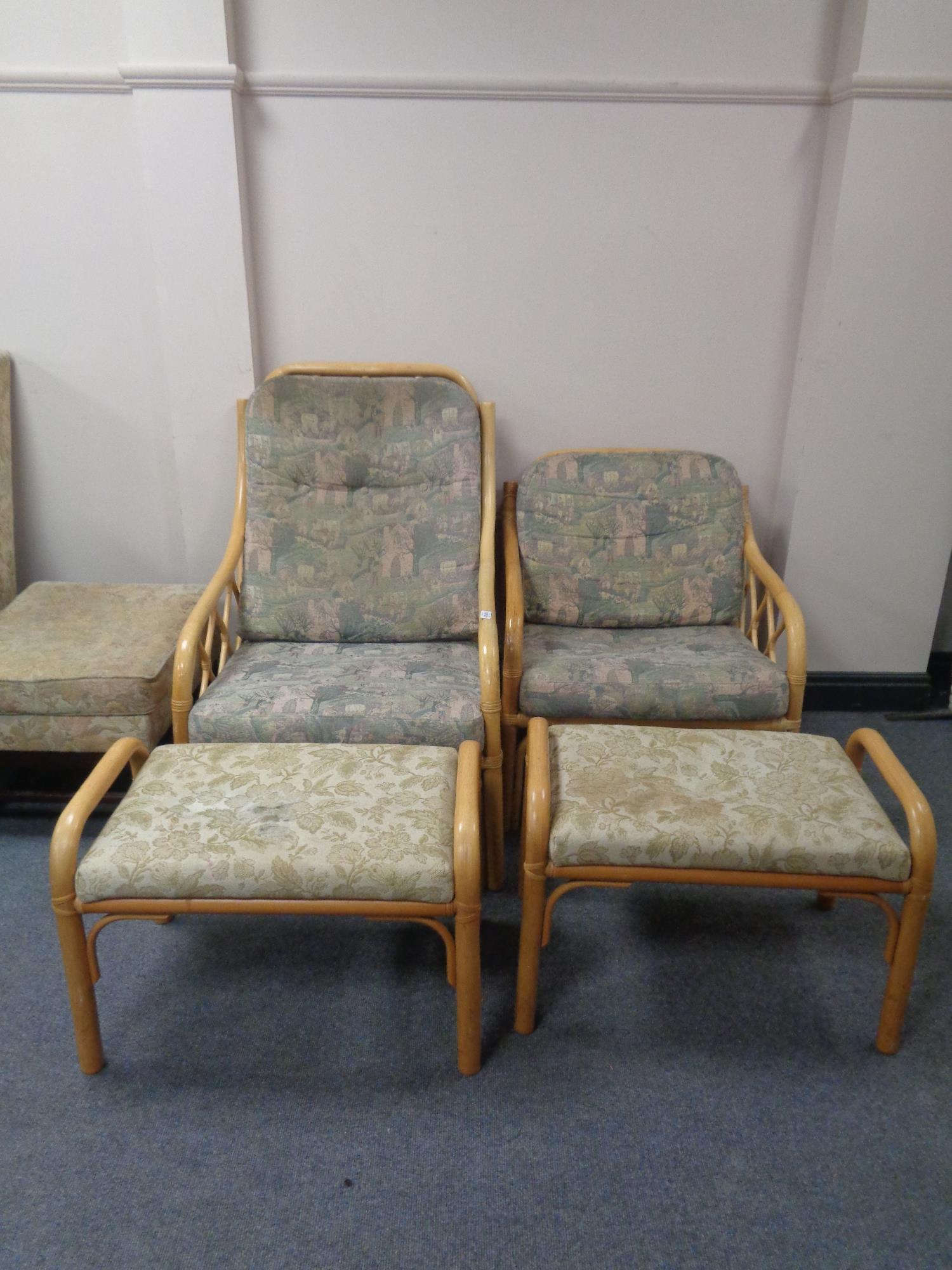 Two bamboo armchairs together with two similar footstools