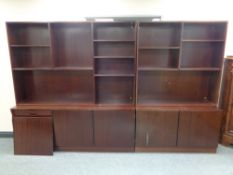 A mid century Danish twin section bookcase with cupboards below (a/f)