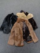 Four fur coats