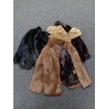 Four fur coats