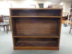 An early twentieth century stained pine bookshelf