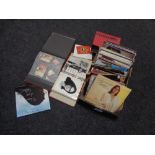 Two boxes containing Nana Mouskouri LPs, some signed,