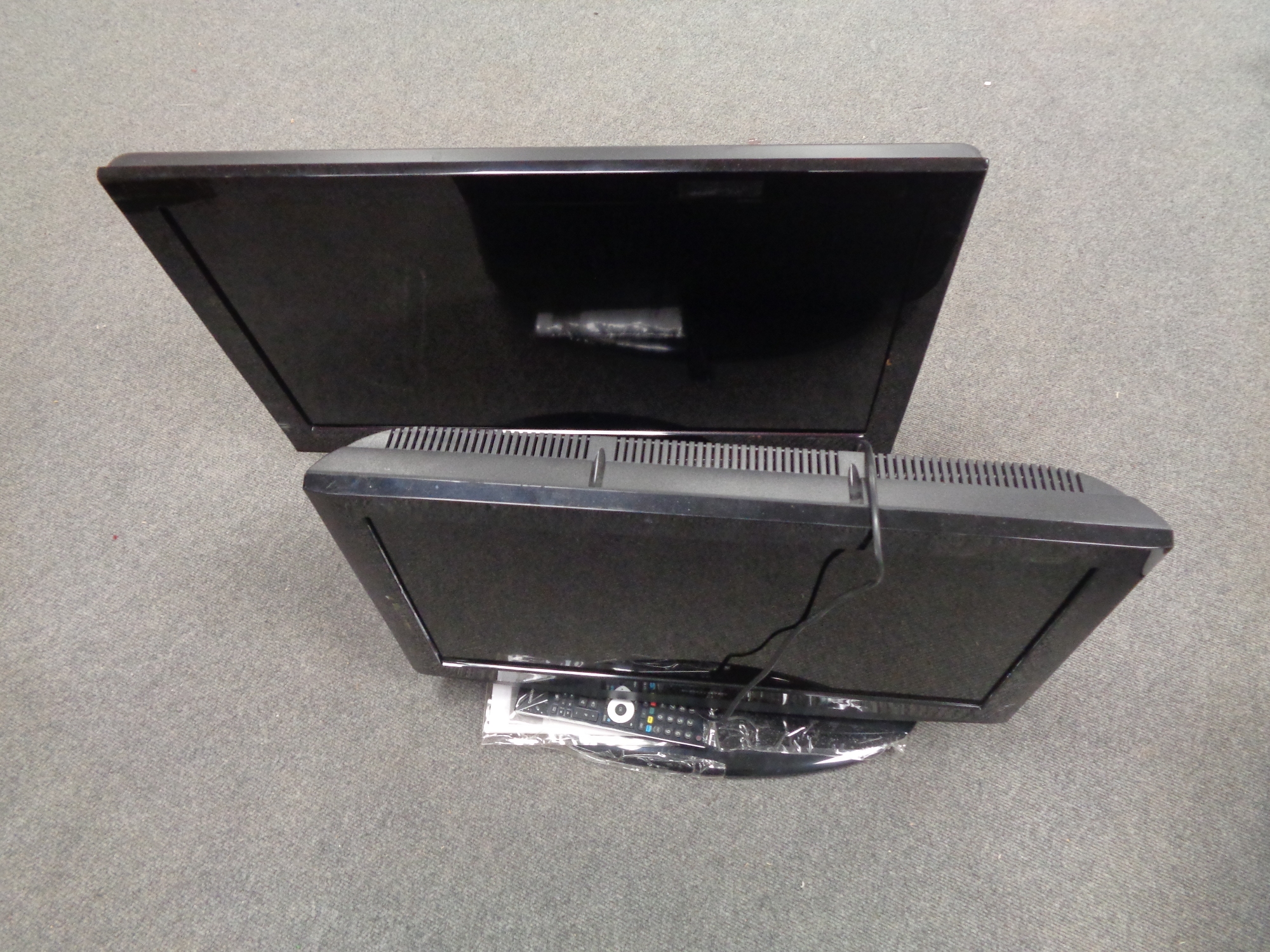 A Grundig 26'' LCD TV with remote together with Samsung 32'' LCD TV (continental wiring).