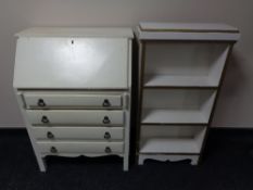 A mid 20th century painted writing bureau together with a set of painted open bookshelves