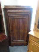 A late nineteenth century mahogany corner cabinet fitted a drawer