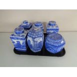 A tray of six assorted Ringtons blue and white caddies