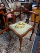 A late 19th century inlaid mahogany corner chair with tapestry seat