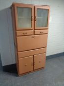 A mid century painted kitchen cabinet