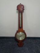 An antique mahogany banjo barometer by B.