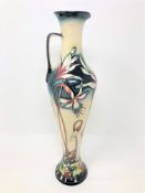 A modern Moorcroft 'Minuet' pattern ewer, impressed marks, height 31.5cm.