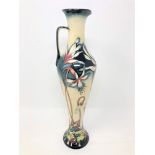 A modern Moorcroft 'Minuet' pattern ewer, impressed marks, height 31.5cm.