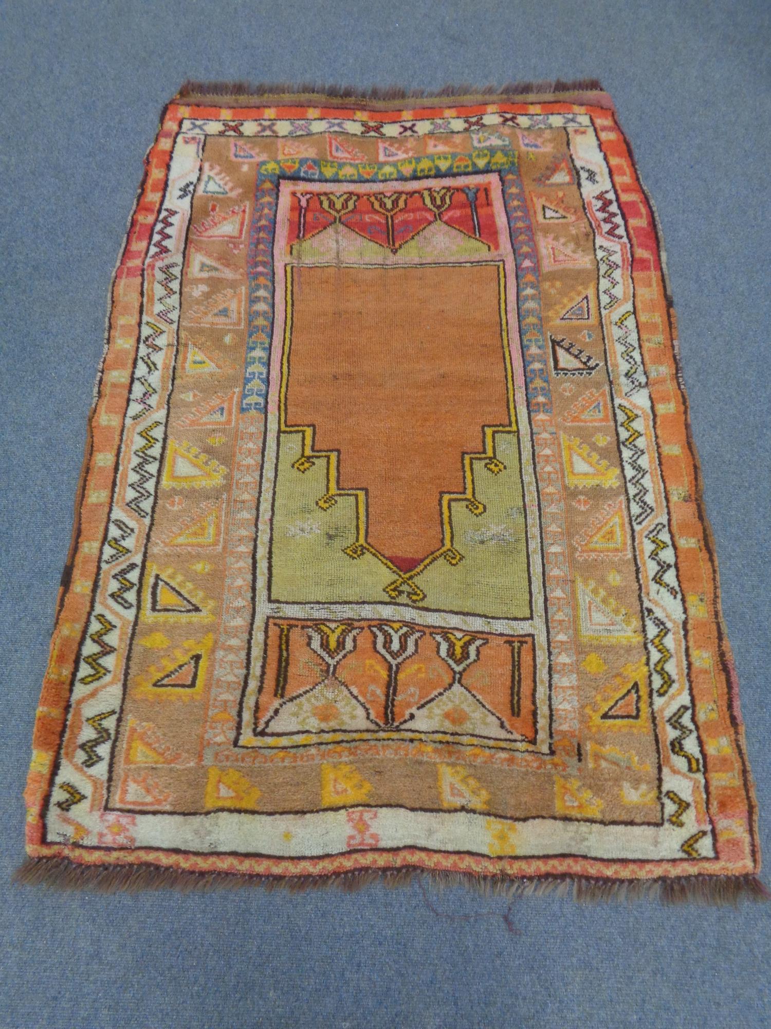 A Iranian prayer rug,