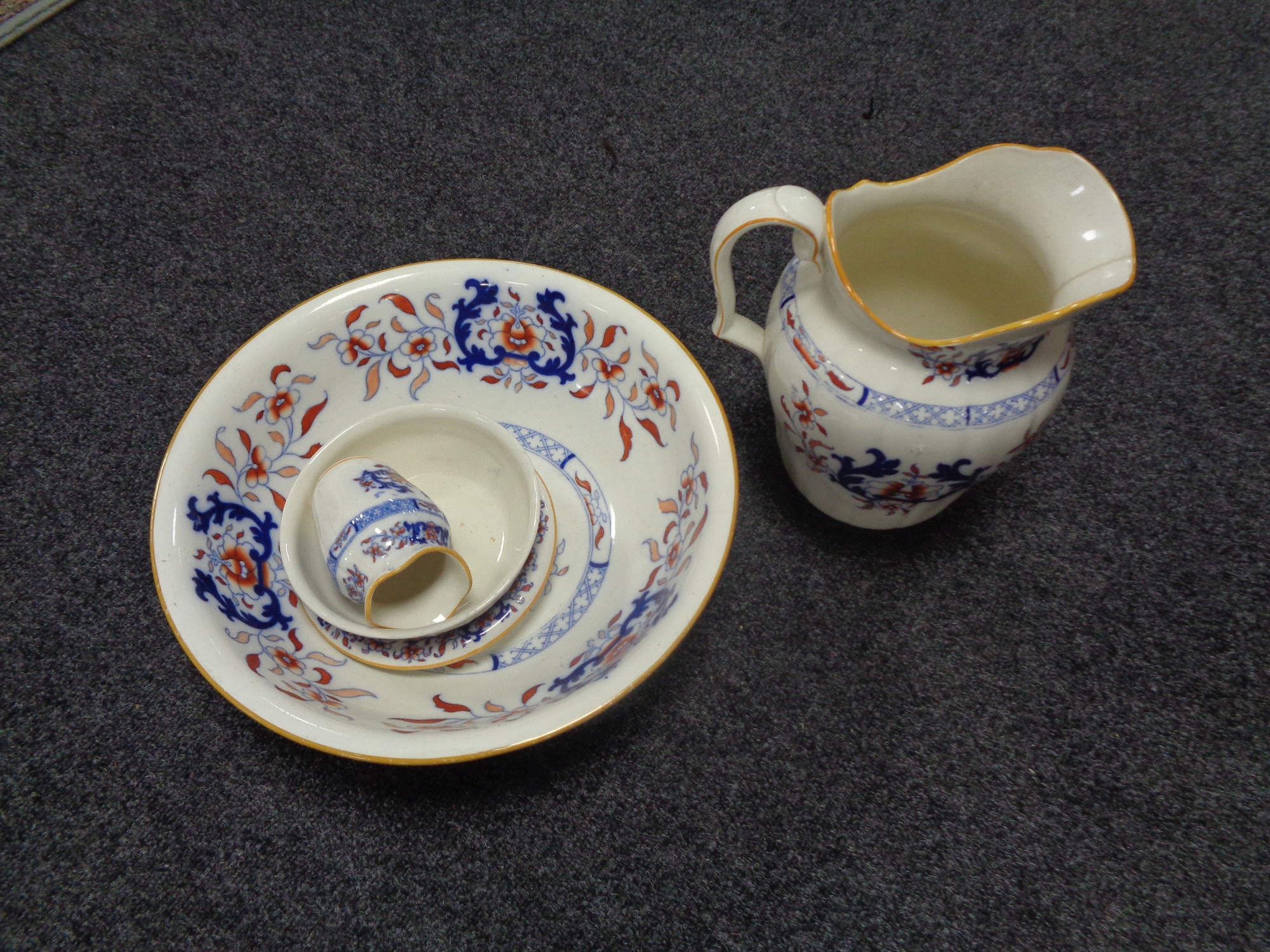 A four piece Victorian Mintons china wash set