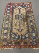 An antique Caucasian rug,