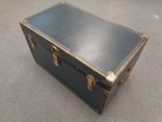 A twentieth century metal bound shipping trunk